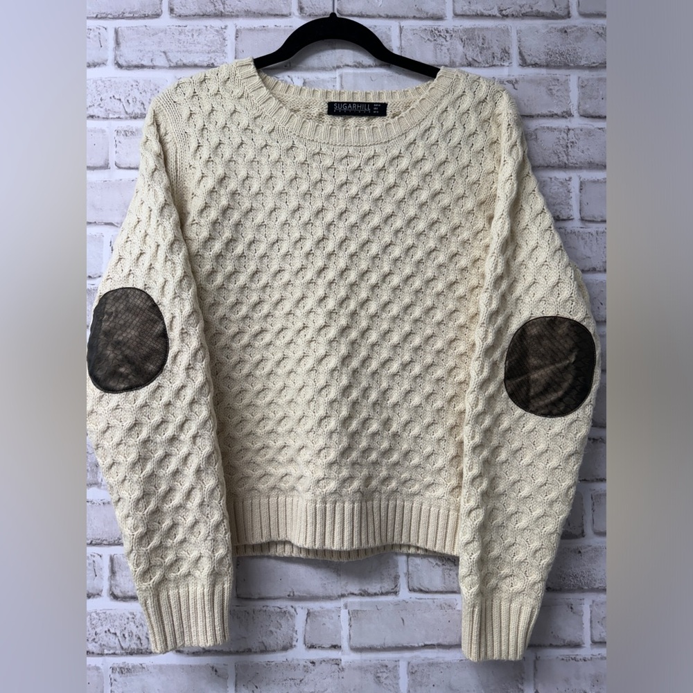 Sugarhill Boutique soft sweater cream color with reptile print elbow accents.